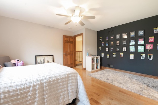 1252 Mary Hill Cir, Hartland, WI 53029 - bedroom featuring wood finished floors and a ceiling fan