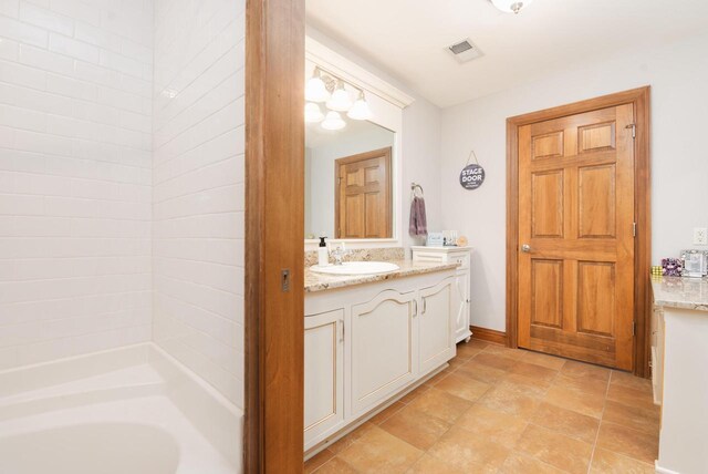 1252 Mary Hill Cir, Hartland, WI 53029 - bathroom with vanity and a bathtub