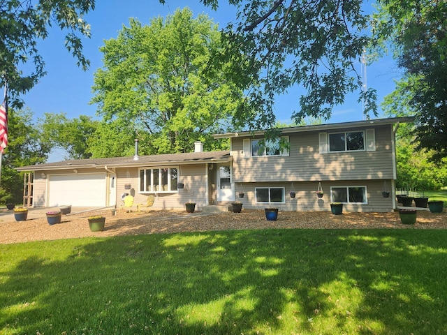 8845 388th Ave, Burlington, WI 53105 - view of front of property with a garage and a front lawn