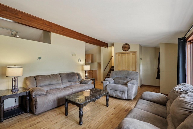 8845 388th Ave, Burlington, WI 53105 - living area featuring light wood-style floors, stairs, and track lighting