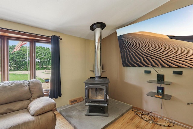 8845 388th Ave, Burlington, WI 53105 - detailed view of a wood stove and wood finished floors