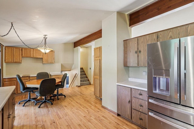 8845 388th Ave, Burlington, WI 53105 - kitchen with stainless steel fridge with ice dispenser, light countertops, and light wood finished floors