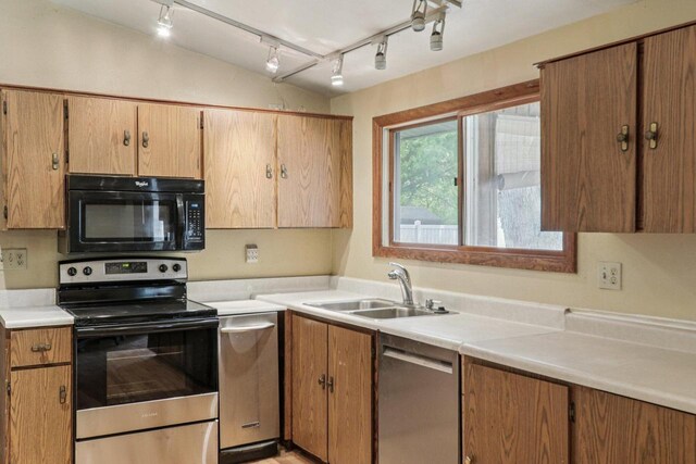 8845 388th Ave, Burlington, WI 53105 - kitchen with stainless steel appliances, rail lighting, and light countertops
