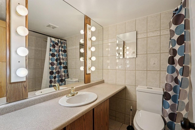 8845 388th Ave, Burlington, WI 53105 - bathroom with tile walls, vanity, a shower with shower curtain, and tile patterned flooring