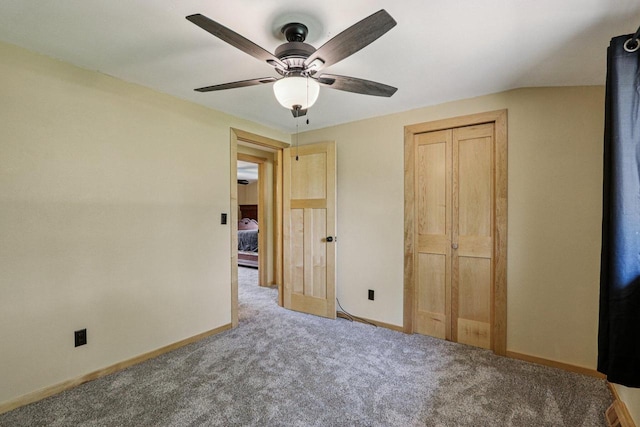 8845 388th Ave, Burlington, WI 53105 - unfurnished bedroom featuring carpet flooring, ceiling fan, and a closet