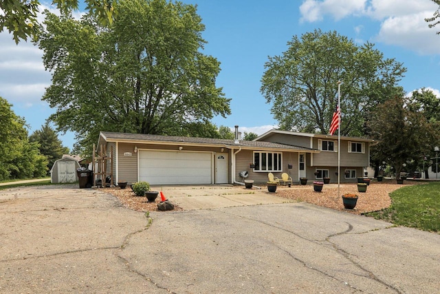 8845 388th Ave, Burlington, WI 53105 - tri-level home featuring a shed, a garage, and driveway