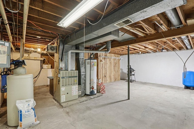 8845 388th Ave, Burlington, WI 53105 - unfinished basement with water heater, a water pressure tank, and heating unit