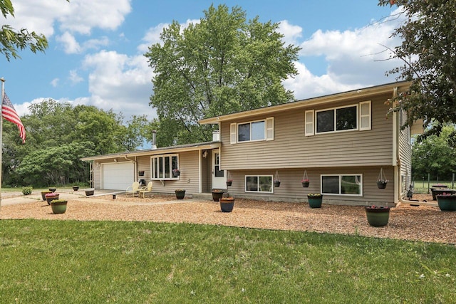 8845 388th Ave, Burlington, WI 53105 - tri-level home with a garage, a front yard, and driveway