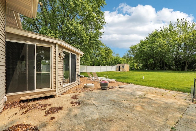 8845 388th Ave, Burlington, WI 53105 - view of patio / terrace with a storage shed and view of wooded area