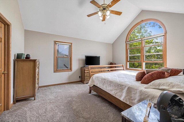 6705 Brian Dr, Waterford, WI 53185 - bedroom with vaulted ceiling, light colored carpet, baseboards, and a ceiling fan