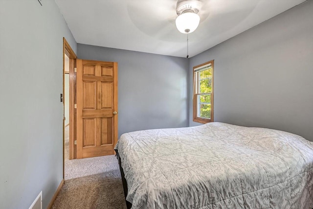 6705 Brian Dr, Waterford, WI 53185 - carpeted bedroom featuring baseboards and a ceiling fan