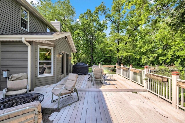 6705 Brian Dr, Waterford, WI 53185 - wooden deck with outdoor dining space and grilling area