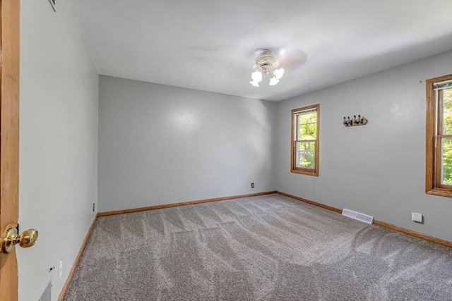 6705 Brian Dr, Waterford, WI 53185 - carpeted empty room featuring ceiling fan and baseboards