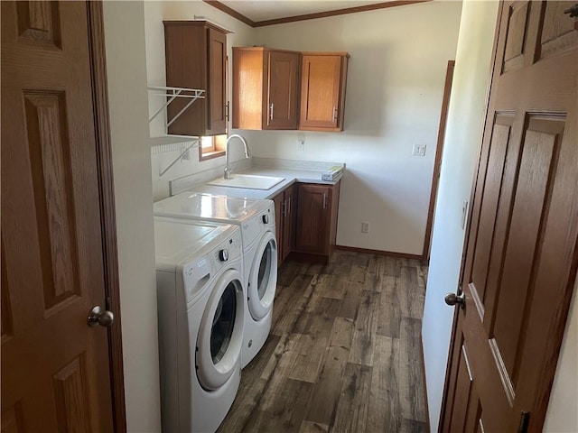 163 230th St, Osceola, WI 54020 - laundry room with cabinet space, washing machine and dryer, dark wood-style floors, baseboards, and crown molding