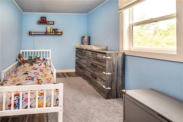 W9952 State Highway 54, Black River Falls, WI 54615 - bedroom with wood finished floors and ornamental molding