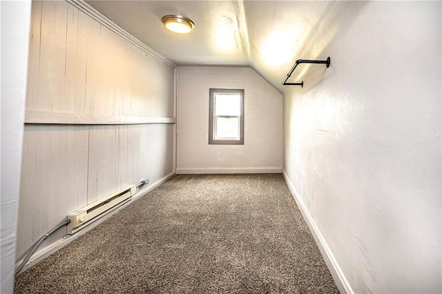 W9952 State Highway 54, Black River Falls, WI 54615 - carpeted spare room featuring a baseboard radiator, vaulted ceiling, and baseboards