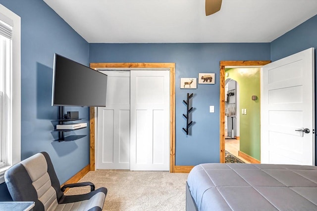 405 W Washington St, Waterford, WI 53185 - carpeted bedroom with a closet and ceiling fan