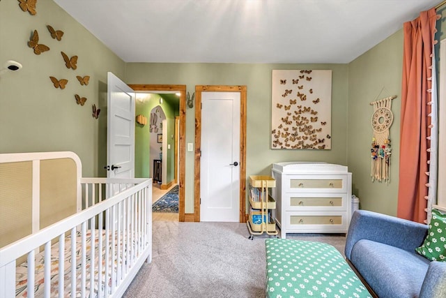 405 W Washington St, Waterford, WI 53185 - bedroom featuring carpet flooring and a crib