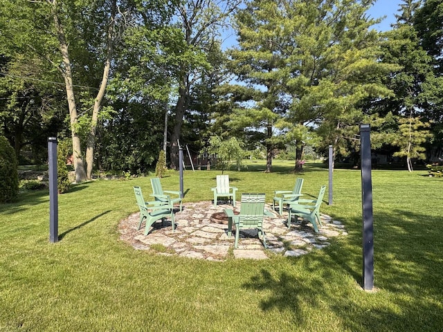 405 W Washington St, Waterford, WI 53185 - view of grassy yard featuring an outdoor fire pit