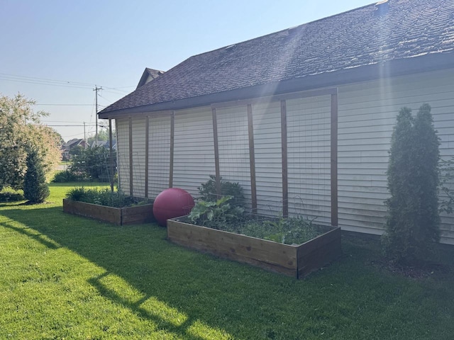 405 W Washington St, Waterford, WI 53185 - view of outdoor structure with a vegetable garden