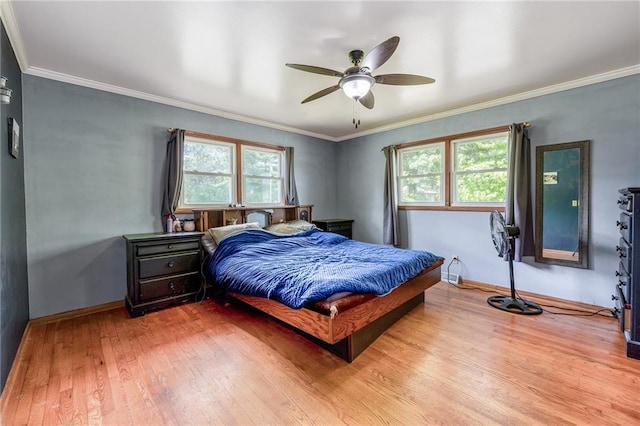 5603 170th St, Chippewa Falls, WI 54729 - bedroom with wood finished floors, baseboards, crown molding, and ceiling fan