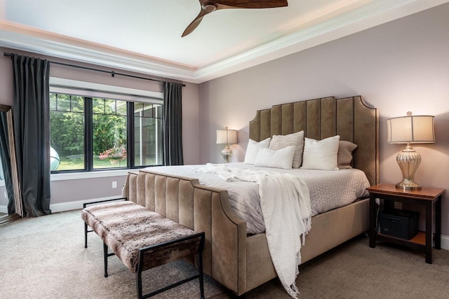 1102 Eldon Way, Edgerton, WI 53534 - carpeted bedroom featuring baseboard heating, a ceiling fan, and crown molding