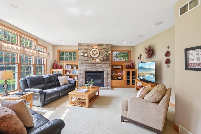 3944 Caribou Rd, Verona, WI 53593 - living area with carpet flooring, a fireplace, and recessed lighting