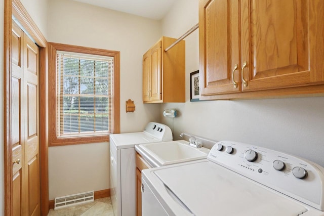3944 Caribou Rd, Verona, WI 53593 - laundry room featuring cabinet space and washer and dryer
