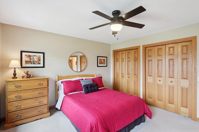 3944 Caribou Rd, Verona, WI 53593 - carpeted bedroom with two closets and ceiling fan
