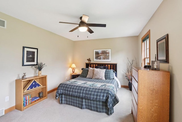 3944 Caribou Rd, Verona, WI 53593 - carpeted bedroom with baseboards and a ceiling fan