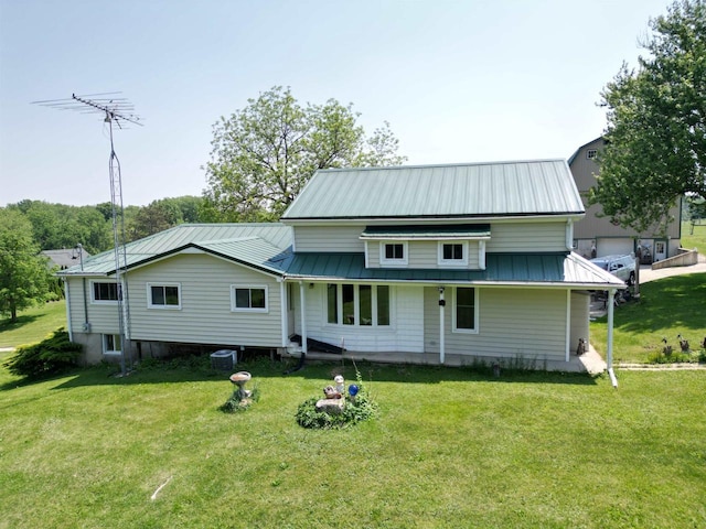 3213 W County M Rd, Edgerton, WI 53534 - view of front of home with a front lawn and metal roof