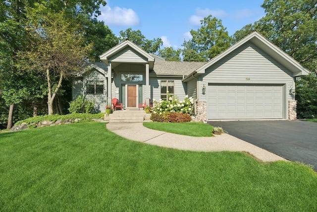 726 Timber Ridge Ct, Fontana, WI 53125 - ranch-style home featuring stone siding, driveway, a garage, a front lawn, and roof with shingles
