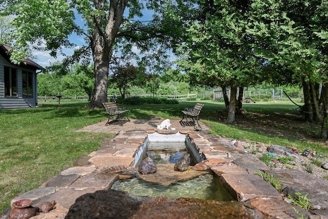 7129 S County Road Jj, Bancroft, WI 54921 - view of yard featuring an outdoor fire pit
