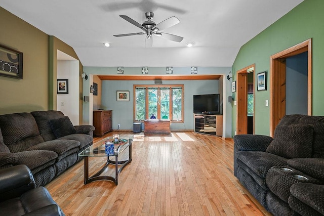 7129 S County Road Jj, Bancroft, WI 54921 - living room featuring hardwood / wood-style floors, vaulted ceiling, and a ceiling fan