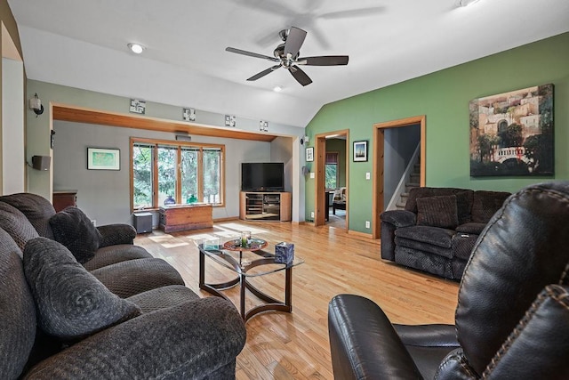 7129 S County Road Jj, Bancroft, WI 54921 - living room with wood finished floors, ceiling fan, lofted ceiling, and stairway