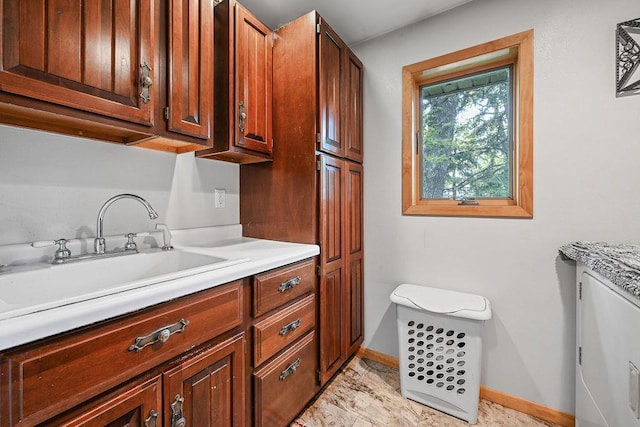 7129 S County Road Jj, Bancroft, WI 54921 - laundry room featuring baseboards and cabinet space