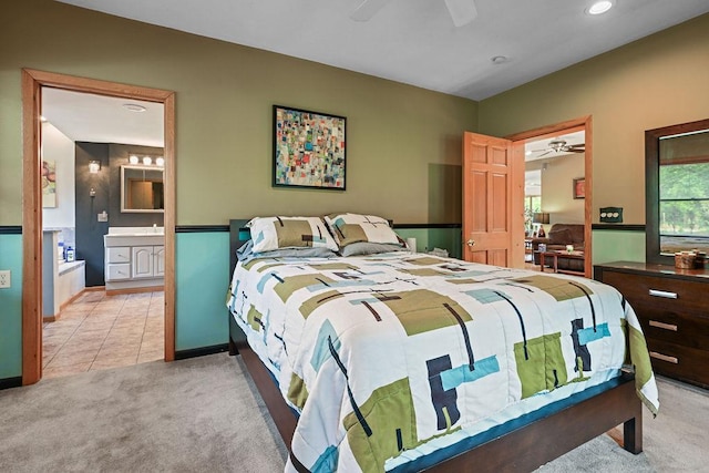 7129 S County Road Jj, Bancroft, WI 54921 - bedroom with light carpet, baseboards, recessed lighting, connected bathroom, and ceiling fan