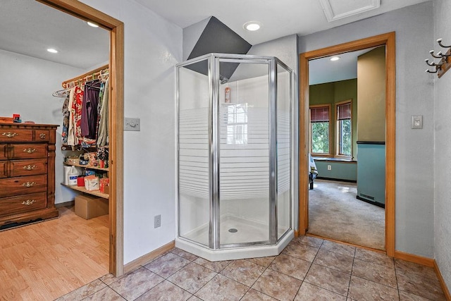 7129 S County Road Jj, Bancroft, WI 54921 - full bath with a stall shower, baseboards, a walk in closet, and recessed lighting