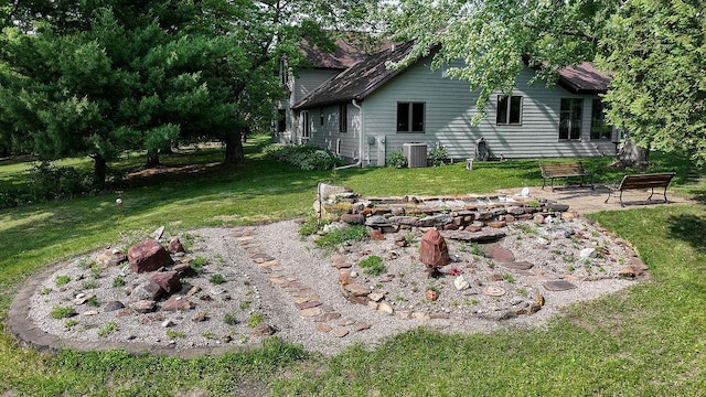 7129 S County Road Jj, Bancroft, WI 54921 - view of green lawn with central AC unit