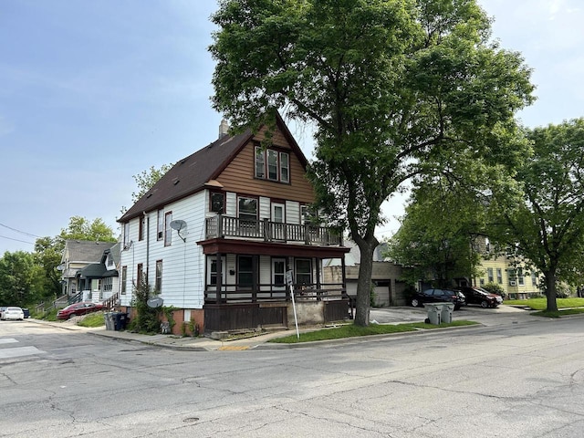 1218 W Locust St, Milwaukee, WI 53206 - view of front of house featuring a chimney