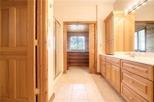 11053 N Robin Ln, Hayward, WI 54843 - full bathroom with vanity, a shower stall, and tile patterned floors