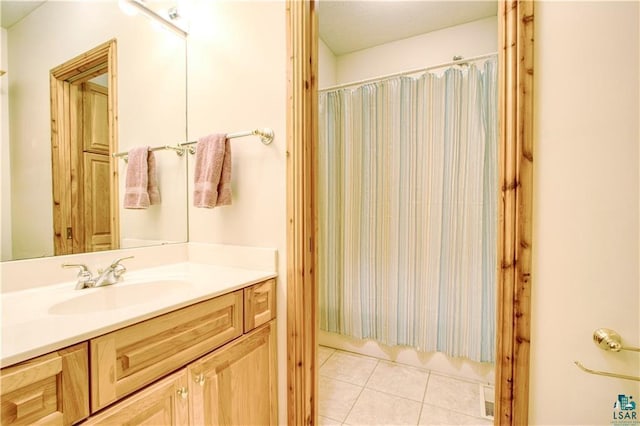 11053 N Robin Ln, Hayward, WI 54843 - bathroom with vanity and tile patterned floors