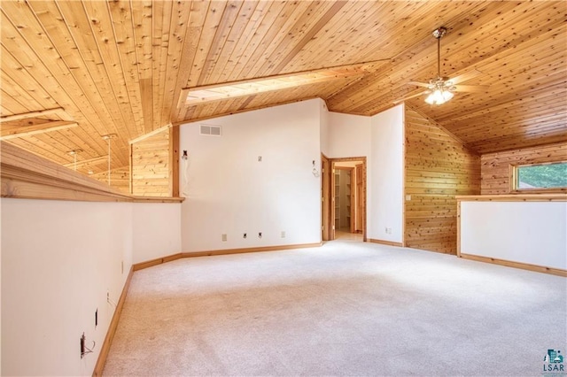 11053 N Robin Ln, Hayward, WI 54843 - unfurnished living room featuring wooden ceiling, vaulted ceiling, carpet flooring, a ceiling fan, and wooden walls