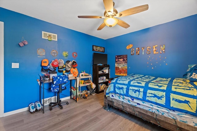 3433 Illinois St, Mount Pleasant, WI 53405 - bedroom with wood finished floors, a ceiling fan, and baseboards