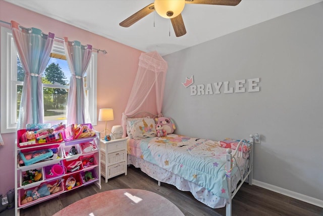 3433 Illinois St, Mount Pleasant, WI 53405 - bedroom featuring wood finished floors, a ceiling fan, and baseboards