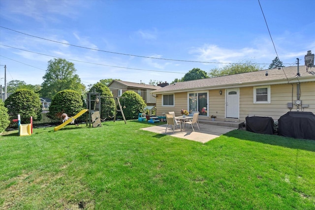 3433 Illinois St, Mount Pleasant, WI 53405 - back of house featuring a patio and a playground
