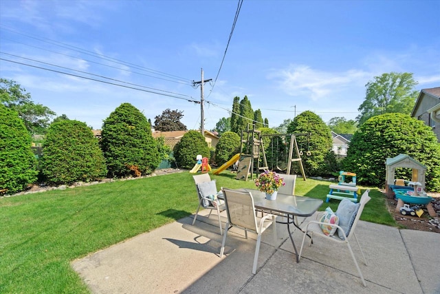 3433 Illinois St, Mount Pleasant, WI 53405 - view of patio featuring a playground and outdoor dining area
