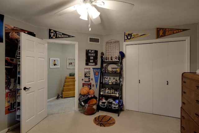 396 Panther Ct, Whitewater, WI 53190 - bedroom featuring a closet, carpet flooring, and a ceiling fan