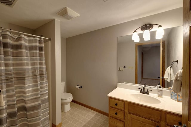 396 Panther Ct, Whitewater, WI 53190 - full bathroom with toilet, vanity, curtained shower, baseboards, and tile patterned floors