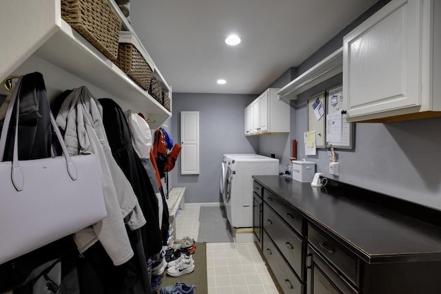 396 Panther Ct, Whitewater, WI 53190 - laundry room with washing machine and dryer, cabinet space, recessed lighting, and baseboards